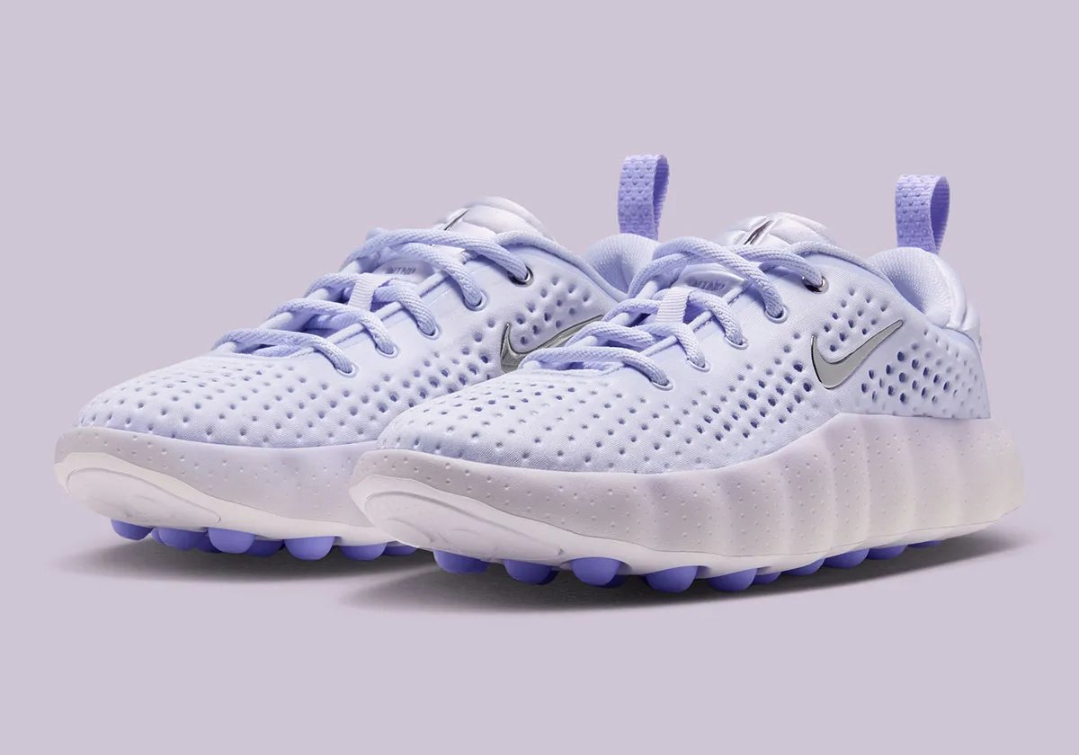 Nike Mind 002 Palest Purple sneaker in women's sizing, featuring lavender upper with white sole and trim details