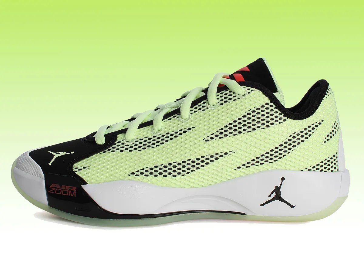 Jordan Luka .77 in Barely Volt and Infrared 23 colorway with jet-black midline accents - detail view 1