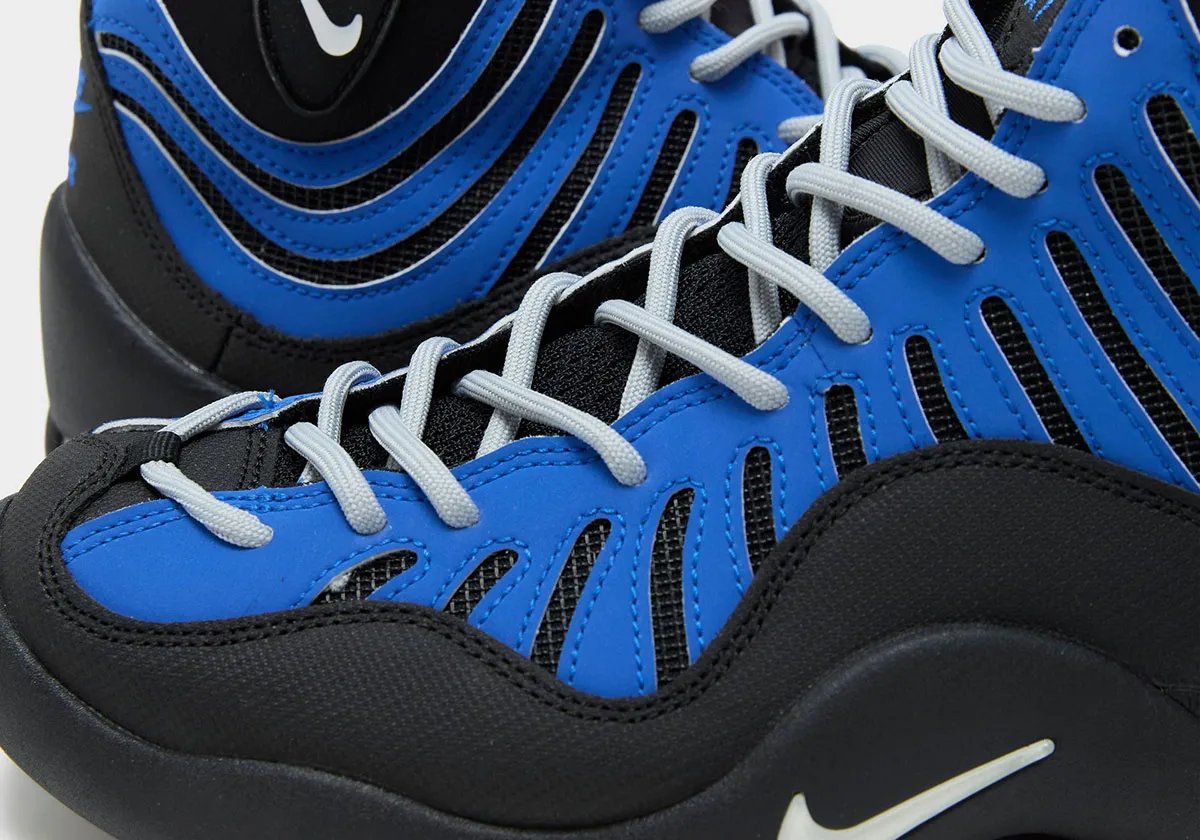 Nike Air Bakin Royal featuring wavy blue upper with Nike Air branding and black white sport split - detail view 1
