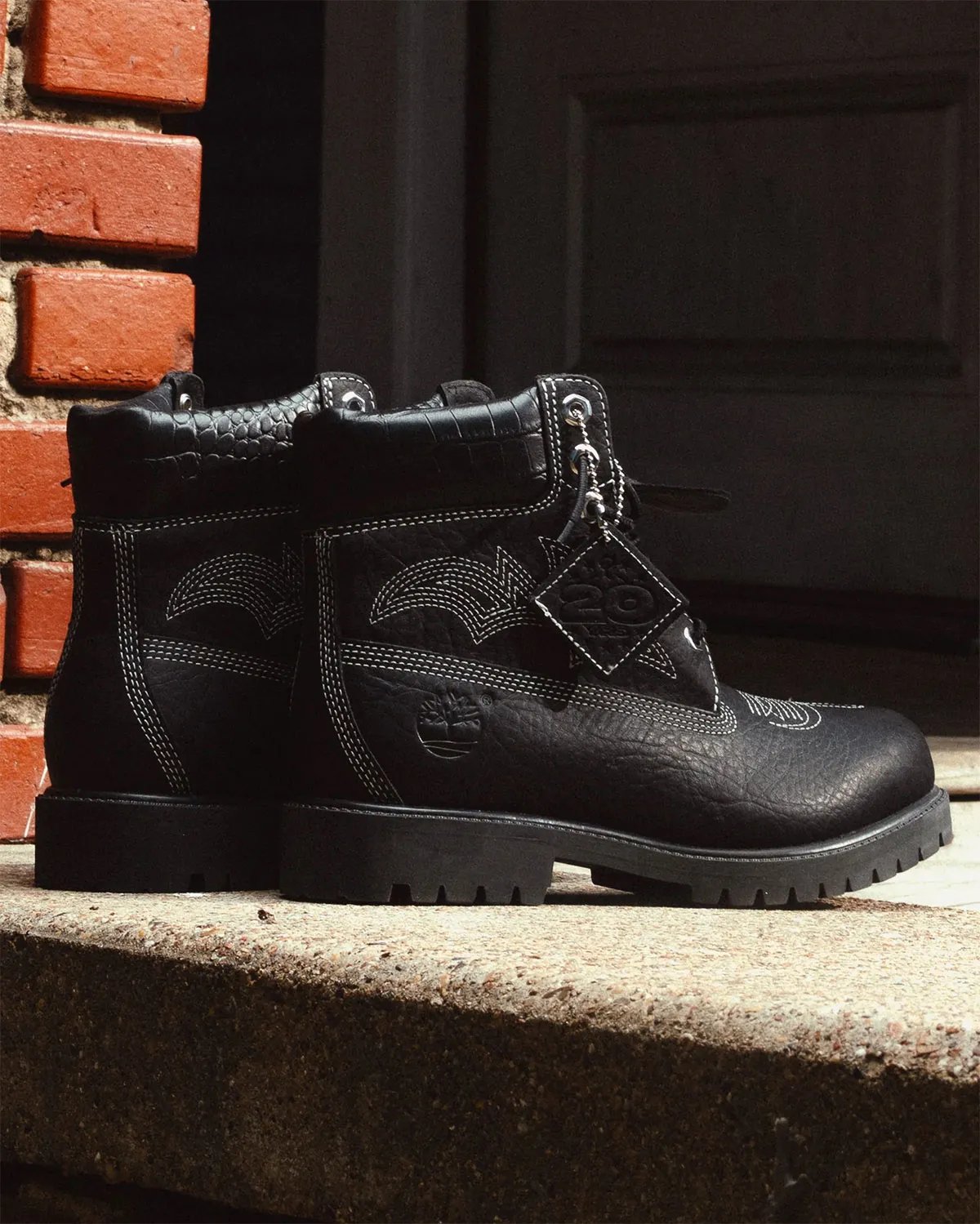 Sneaker Politics x Timberland 6-Inch Boot Outlaw and Rodeo editions featuring pebbled leather, Western stitching, and cow-print detailing - detail view 1