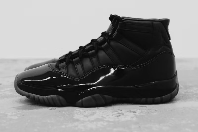 COMME des GARÇONS Homme Plus x Air Jordan 11 in Black with premium full-grain leather and gloss midsole, September 2026 release