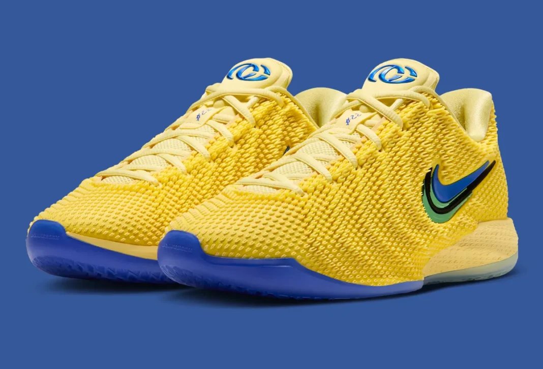Nike Caitlin 1 'Warning Code' featuring yellow Opticast upper with racer blue accents and metallic green details on midsole