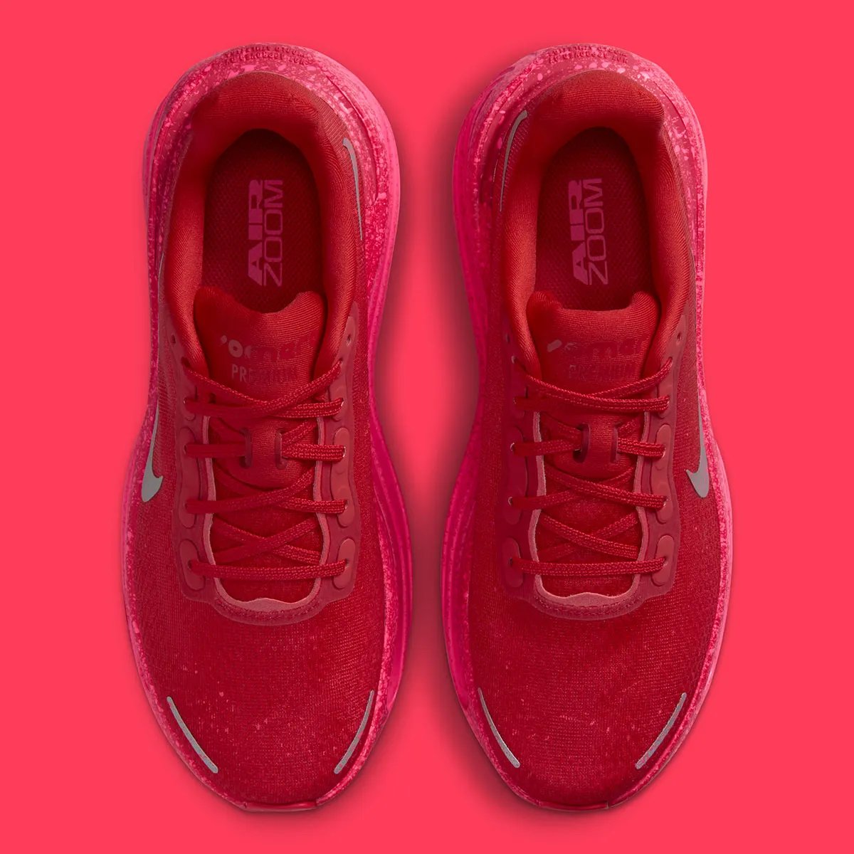 Nike Vomero Premium in University Red with speckled detailing and Hyper Pink sole unit - detail view 3