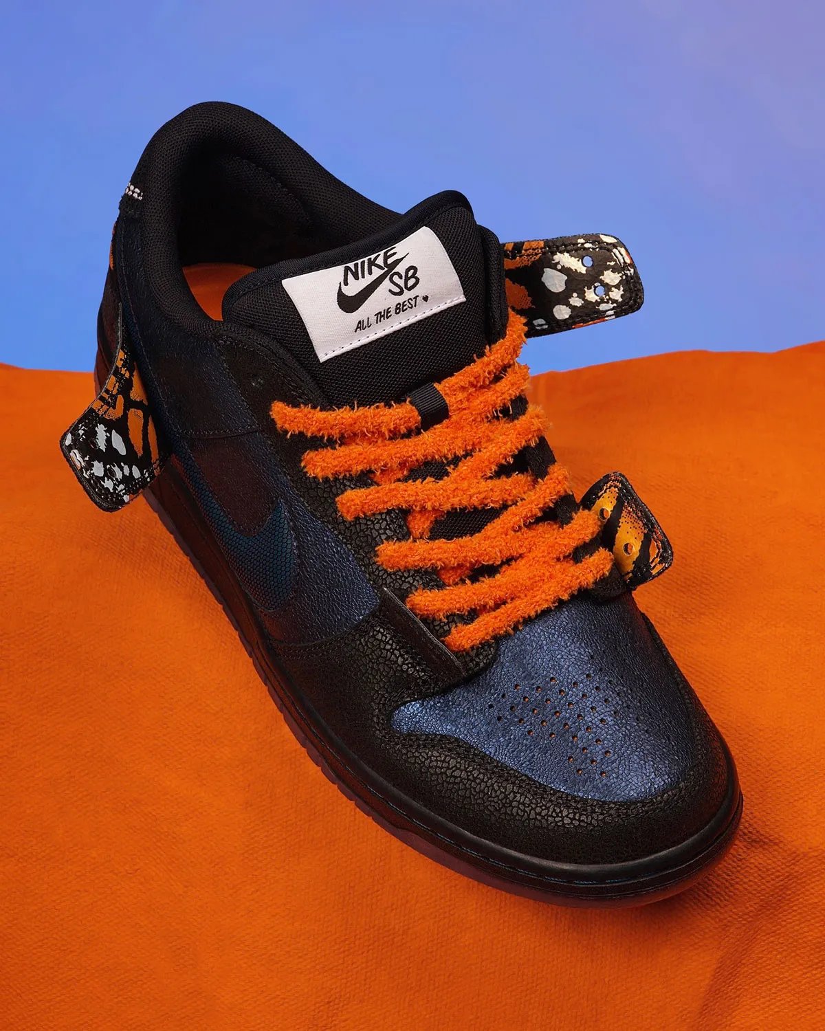 Bluetile x Nike SB Dunk Low Monarch Butterfly in orange and black with fuzzy lacing and hexagonal Swoosh detail - detail view 1