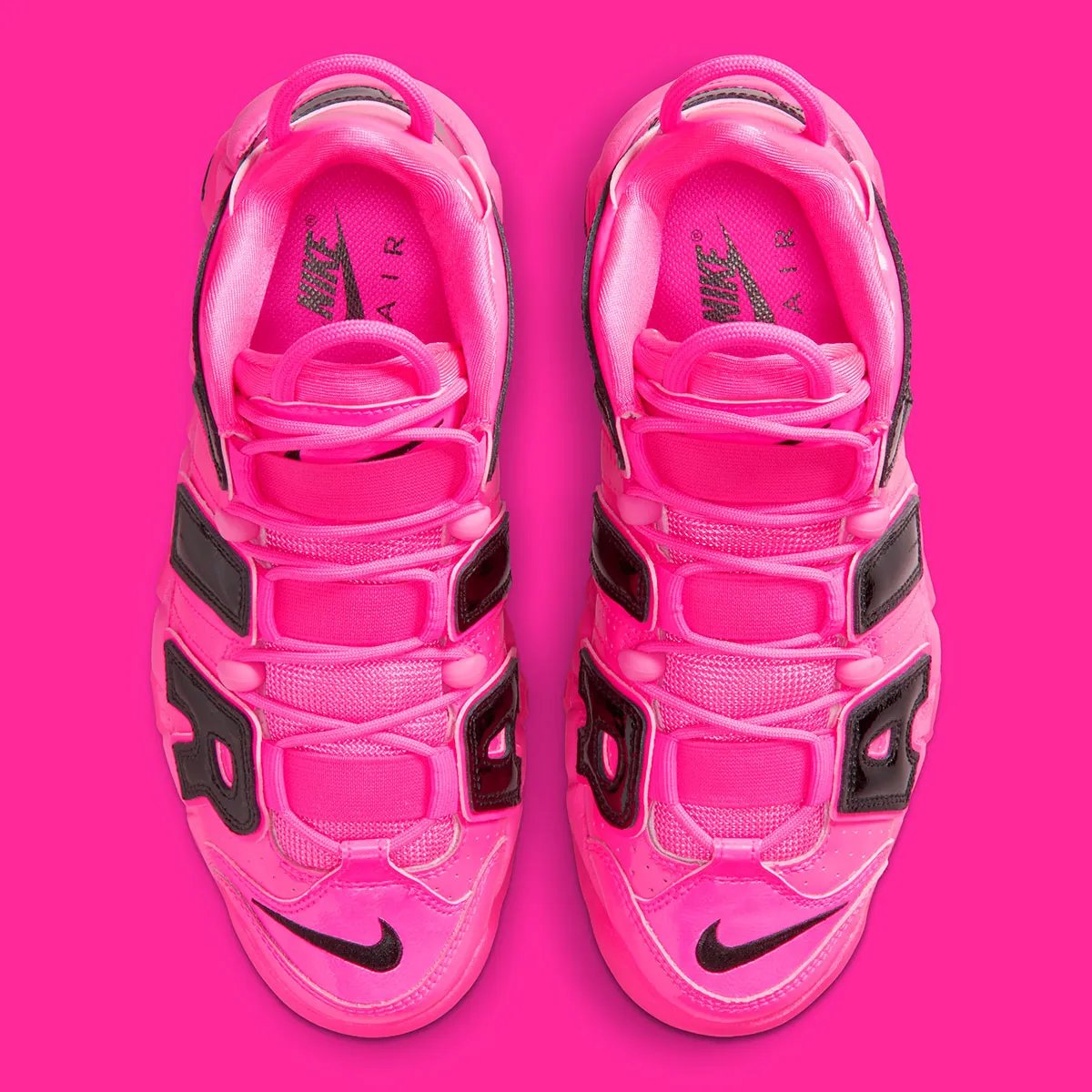 Nike Air More Uptempo '96 in Pink Blast colorway, featuring the signature exaggerated toe box and translucent forefoot paneling - detail view 4