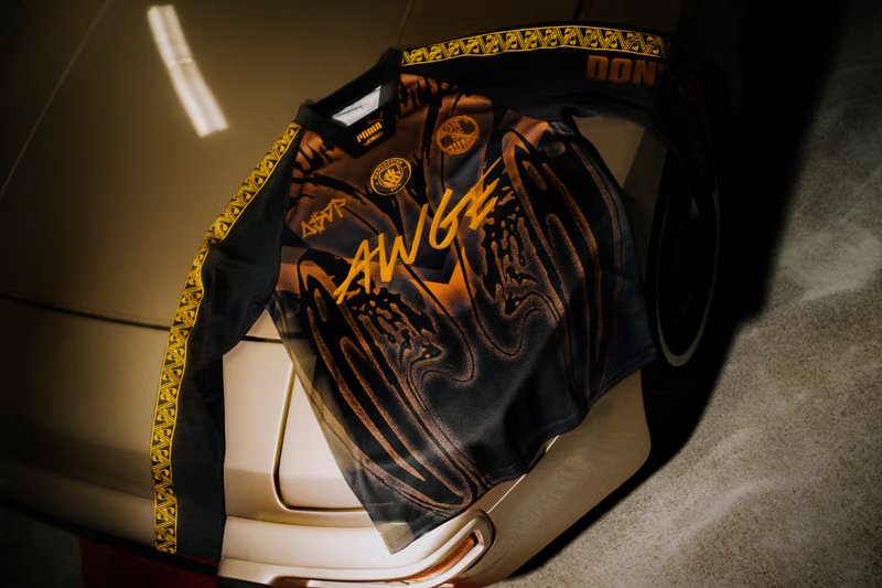 A$AP Rocky x PUMA Manchester City black and archive gold longsleeve jersey with 'DON'T BE DUMB' and 'MANCHESTER' graphics - detail view 4