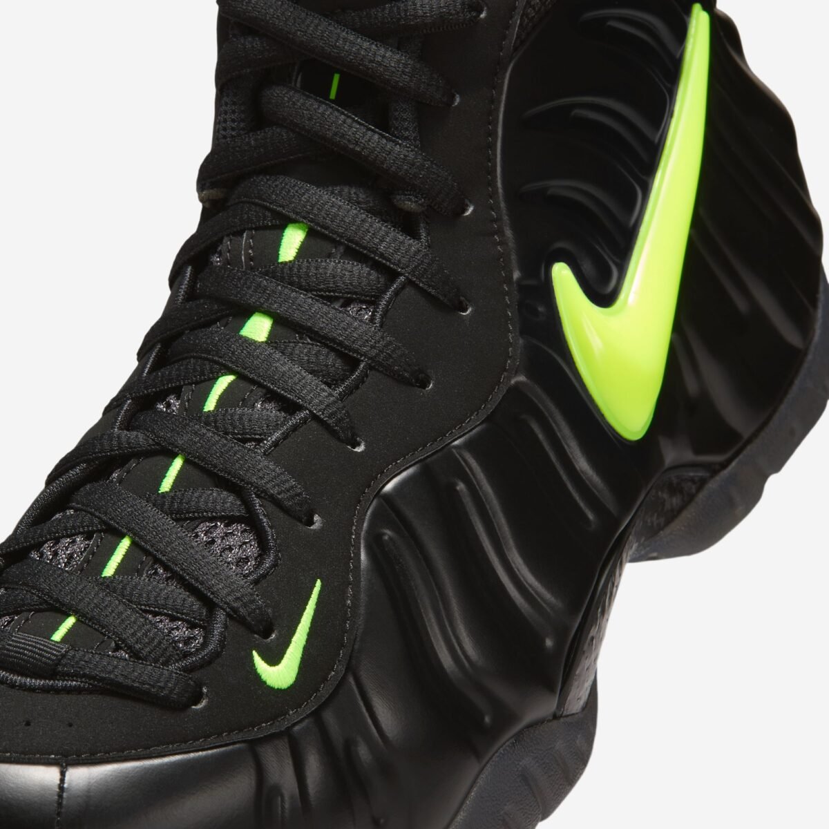 Nike Air Foamposite One Voltage colorway showcasing the signature monoblock foam shell construction - detail view 5
