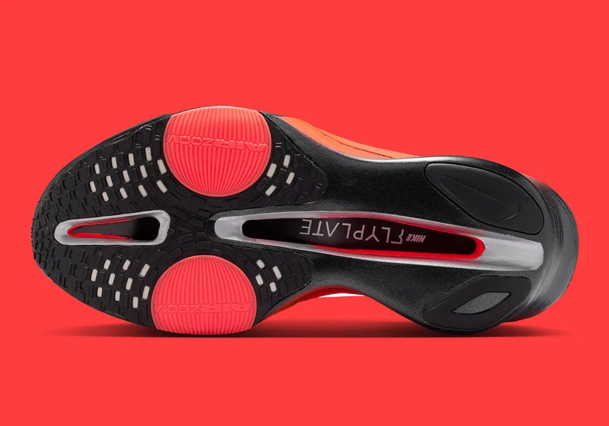 Nike Alphafly 3 in Black, Hyper Crimson, and Wolf Grey with silver Swoosh carabiner clip - detail view 2