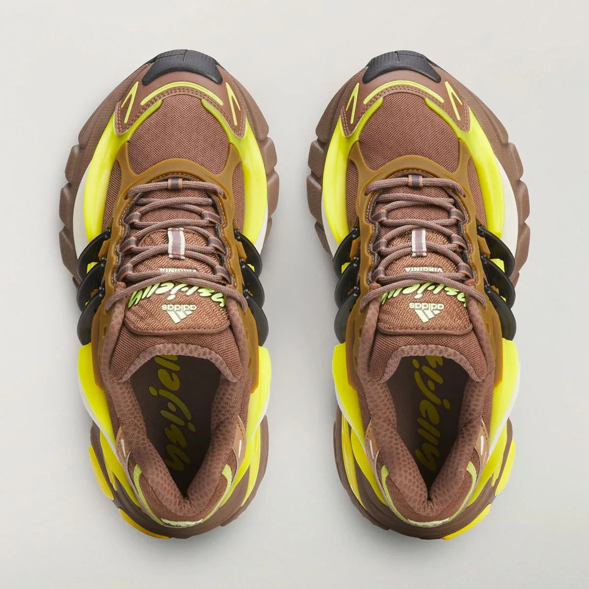 Pharrell x adidas Jellyfish Timber Brown colorway, side profile view showing the rounded silhouette and earth-tone palette - detail view 4