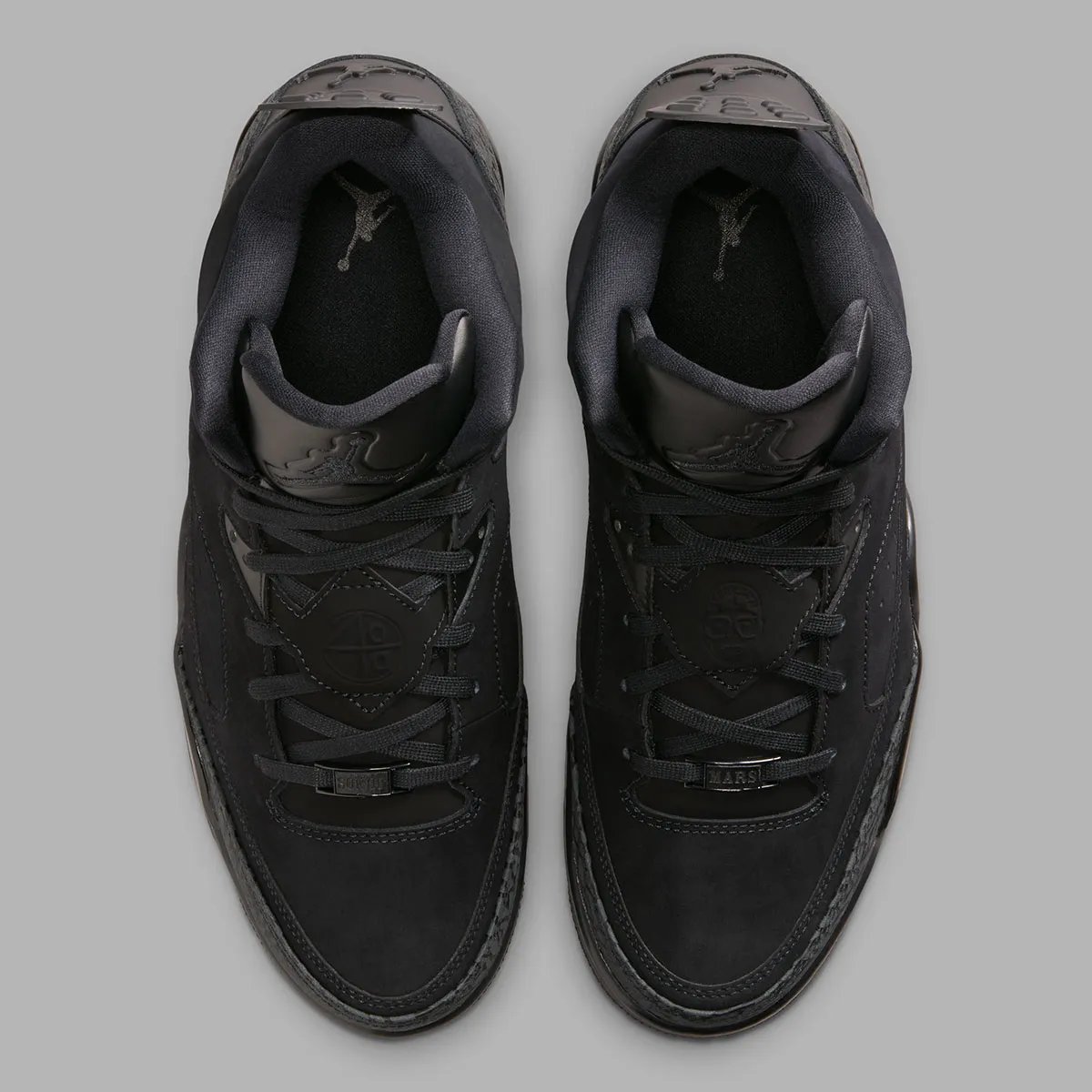 Jordan Son Of Mars Low in Black Cat colorway, full monochromatic black upper with visible Air unit and hybrid design elements from Air Jordan 3-6 - detail view 3