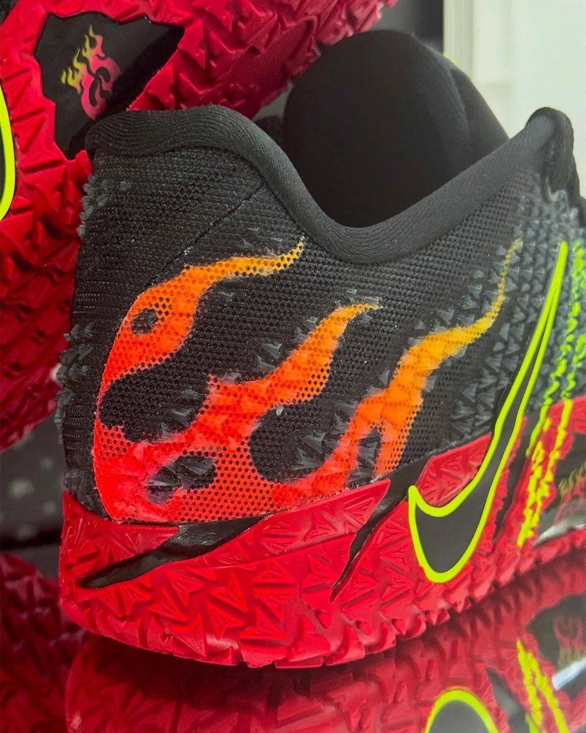 Nike Ja 3 WNBA player exclusive in bold colorway, side profile view showing extended collar and geometric sole structure - detail view 5