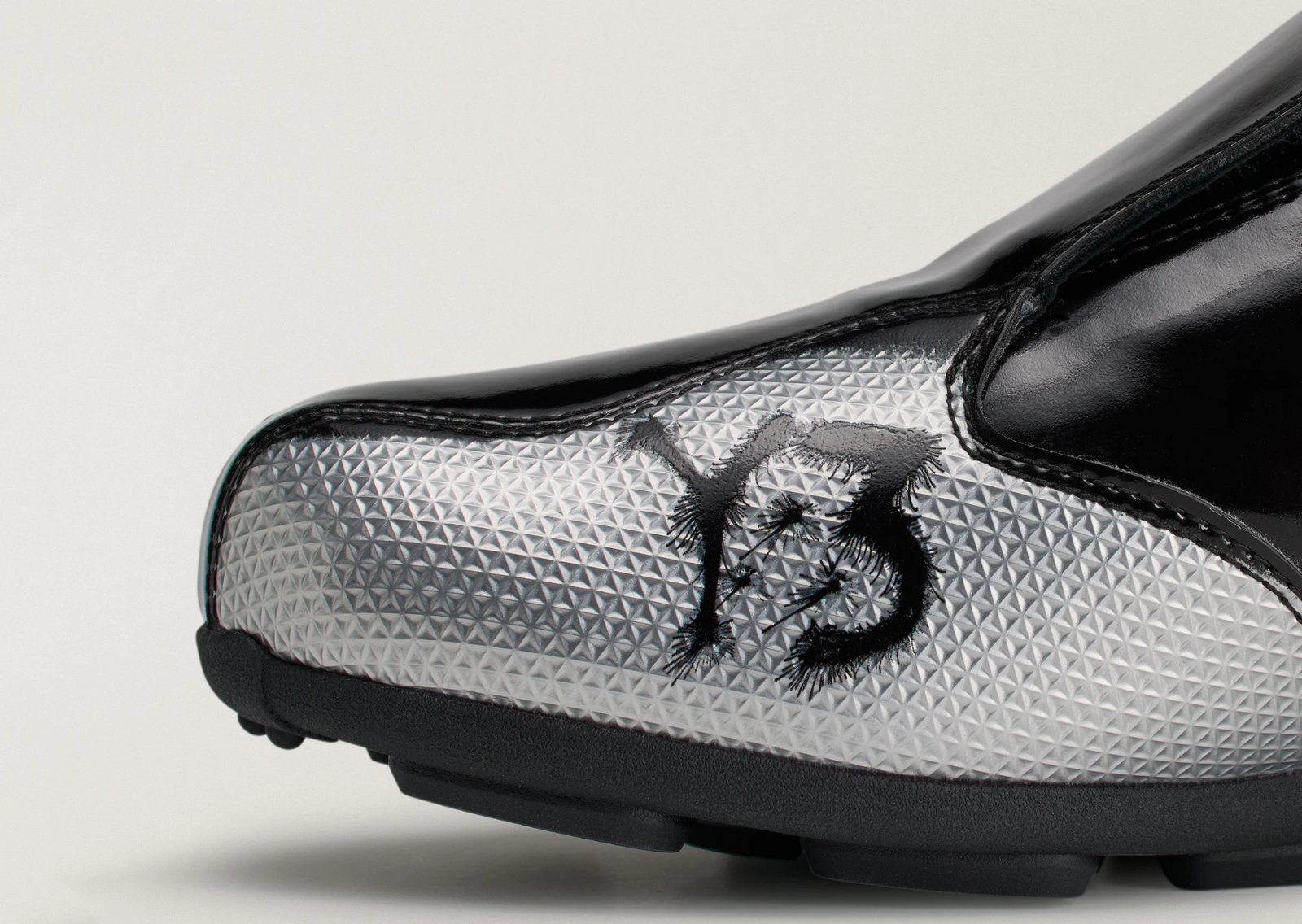 CHITO x adidas Y-3 F50+ Tunit Pack featuring black pair with iridescent toe accents and silver variant - detail view 2