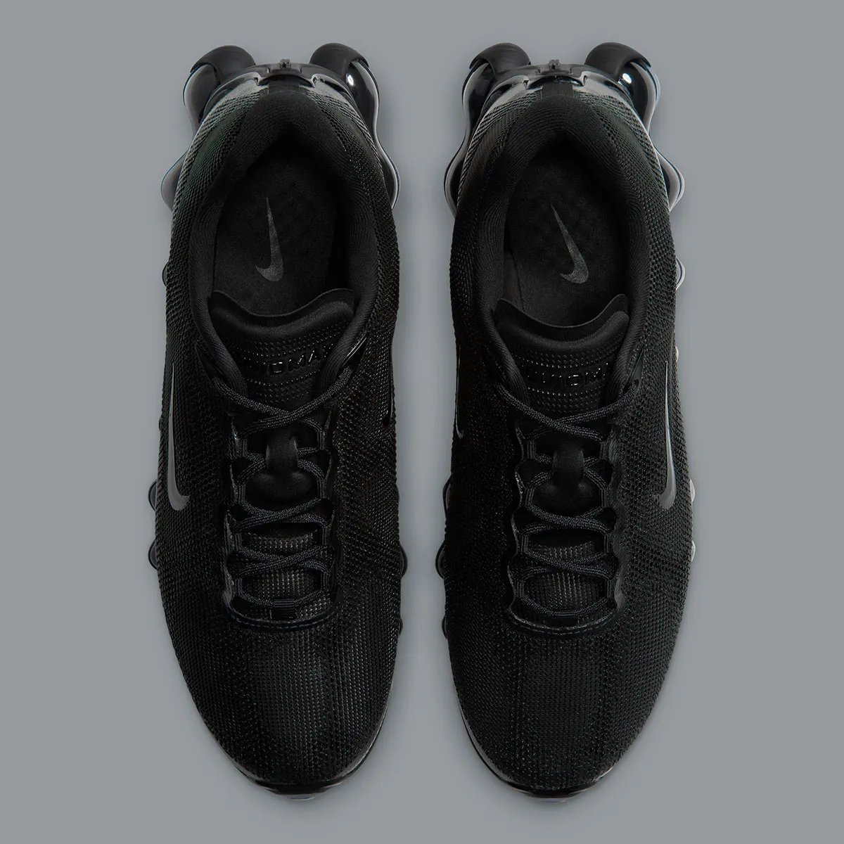 Nike Air Liquid Max in Black/Clear colorway, featuring translucent blue midsole - detail view 3