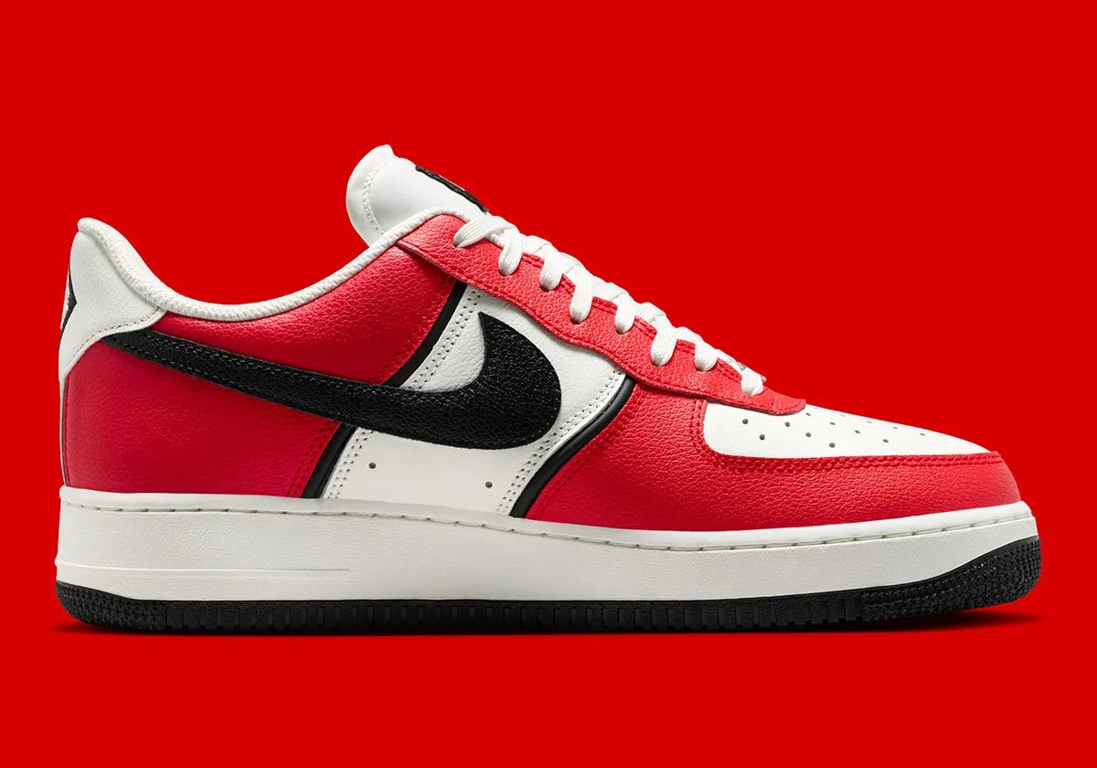 Nike Air Force 1 Low in University Red and black with diamond heel branding and Sail quarter panel - detail view 3