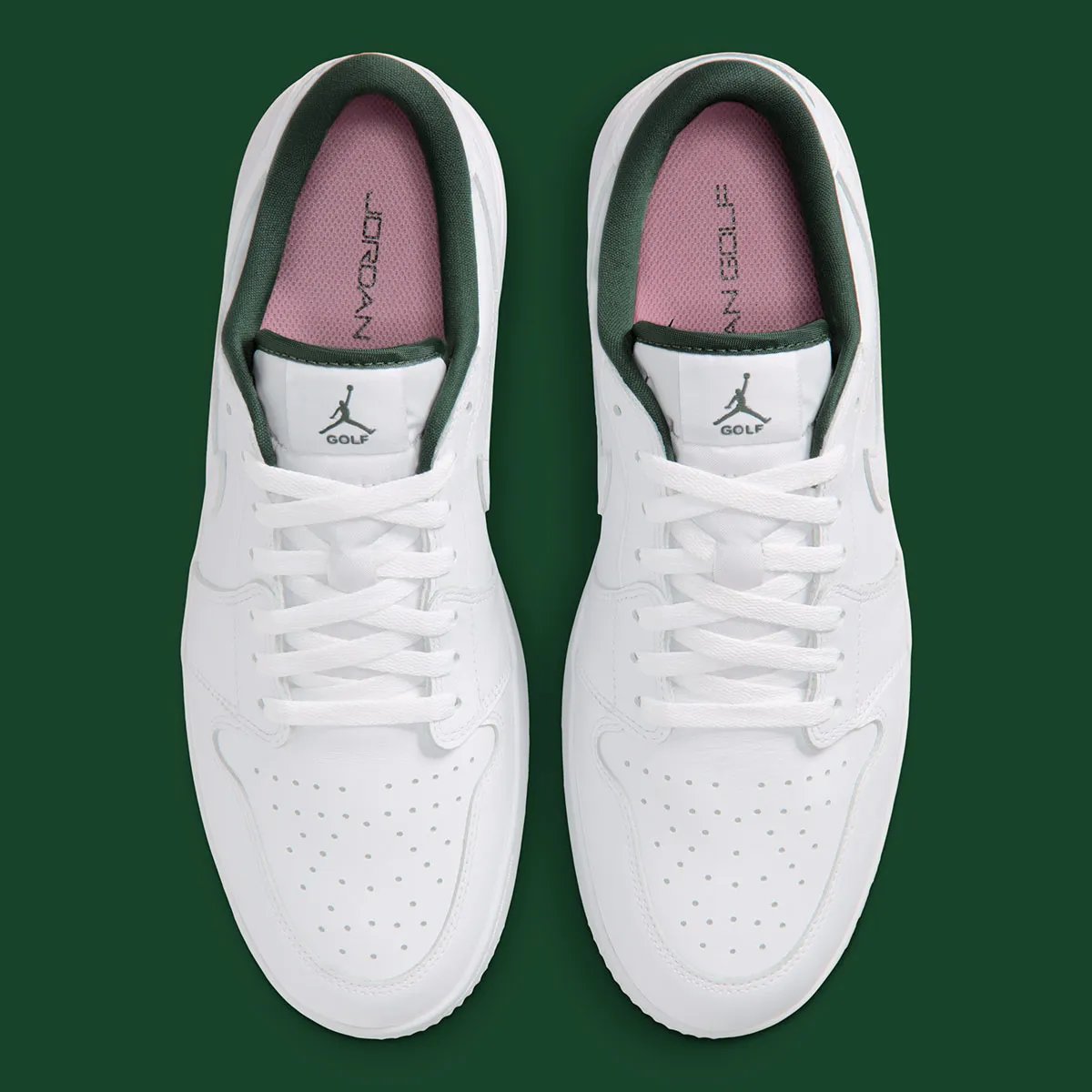 Air Jordan 1 Low Golf White/Fir featuring white leather upper, forest green lining, and pink spikes with redesigned golf sole - detail view 4