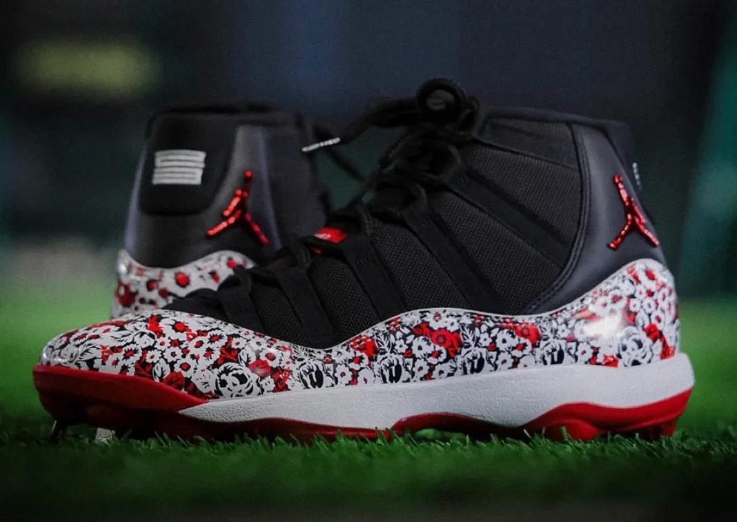 Nike Air Jordan 11 Cleat in black with dense red, white, and grey floral pattern, designed exclusively for the Yomiuri Giants - detail view 1