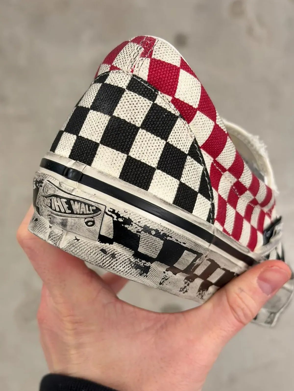 Slam Jam x Vans Slip-On collaboration in white and red checkerboard with distressed canvas and aged midsole detailing - detail view 1