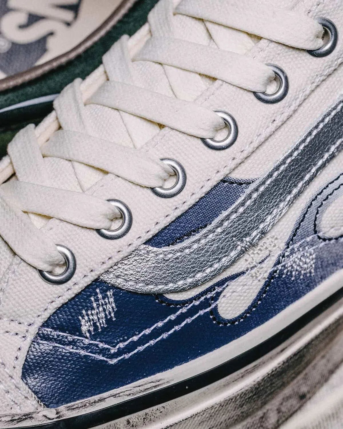 Vans Old Skool in Archive Flame colorway showing canvas upper with side stripe detail - detail view 3