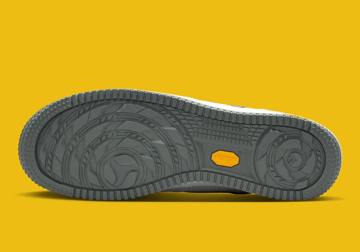 Nike Air Force 1 featuring Vibram outsole technology in neutral colorway, detail shot showing grip-focused rubber sole pattern - detail view 5