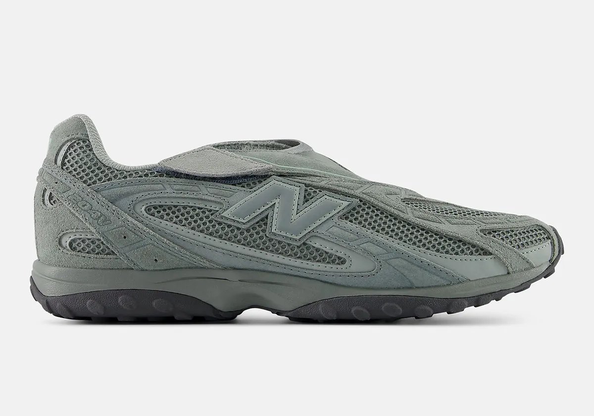 New Balance 204V in pastel Zinc Blue colorway showing Velcro strap closure and mesh construction - detail view 1