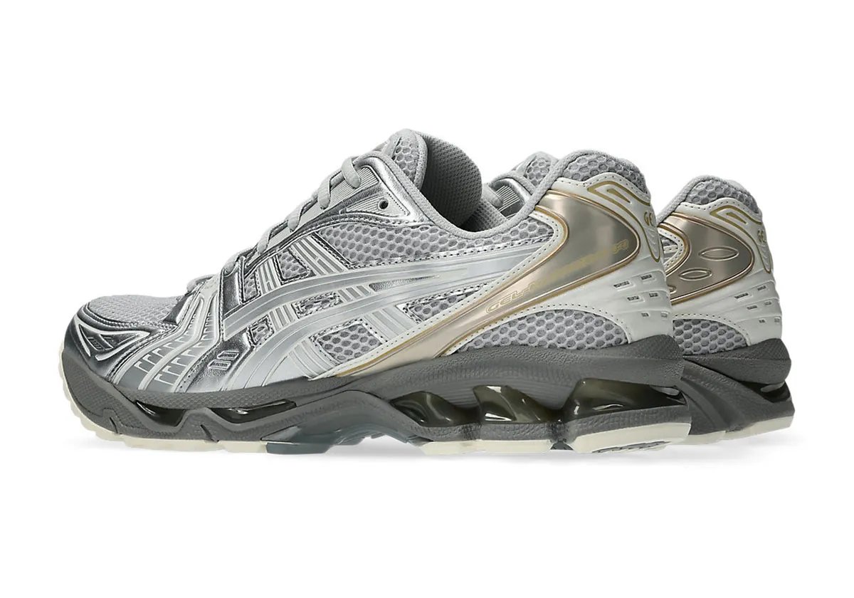 ASICS GEL-Kayano 14 in Concrete colorway, showing neutral tonal upper with reinforced medial support structure - detail view 2