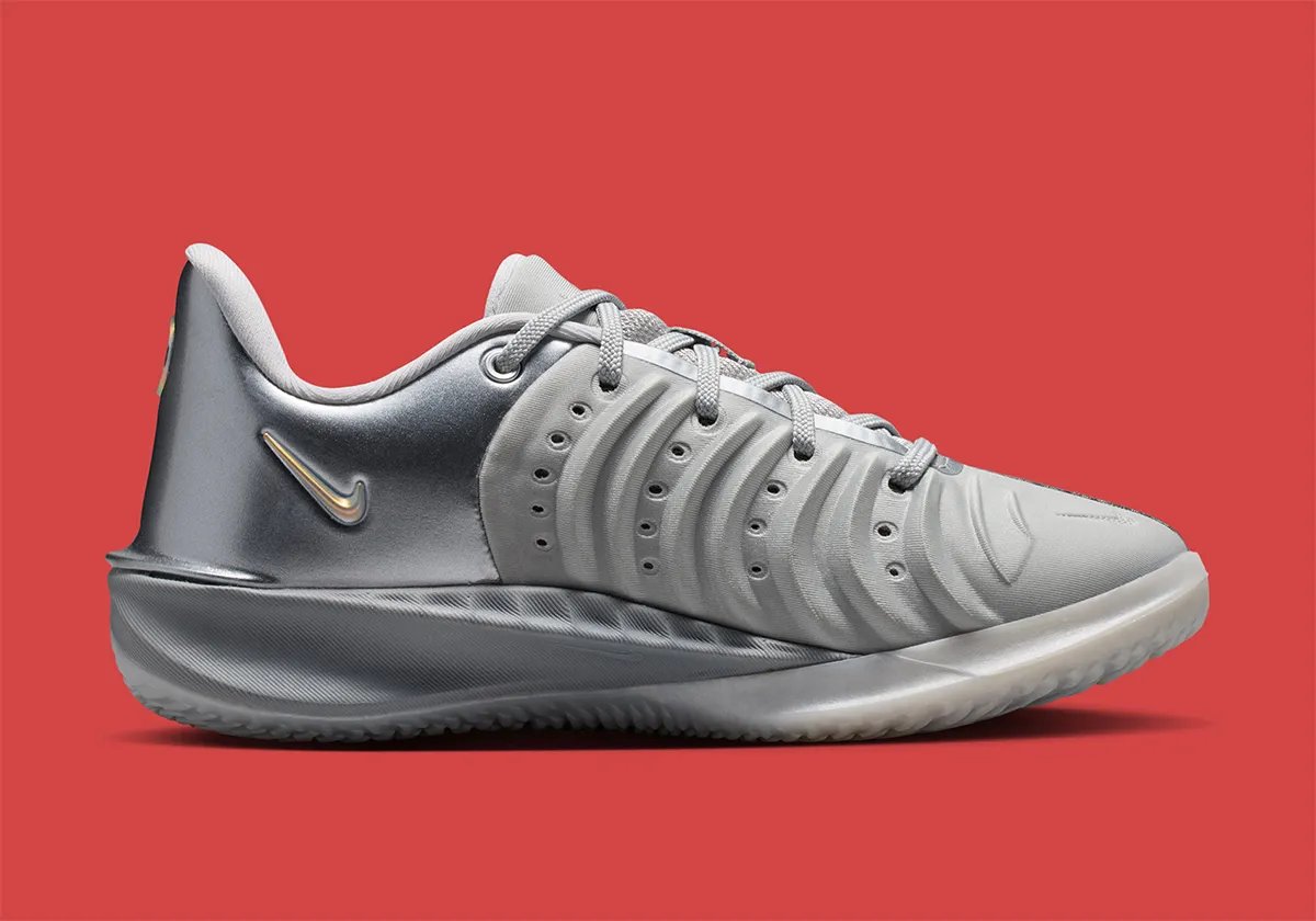 Nike GT Cut 4 in Metallic Silver colorway, full side profile view showing chrome-coated upper - detail view 2