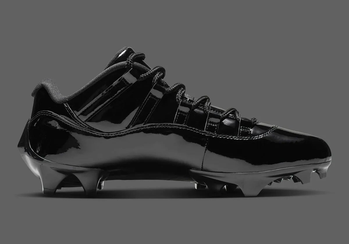 Air Jordan 11 Football Cleat in Anthracite colorway with patent leather collar and carbon fiber shank detail - detail view 2