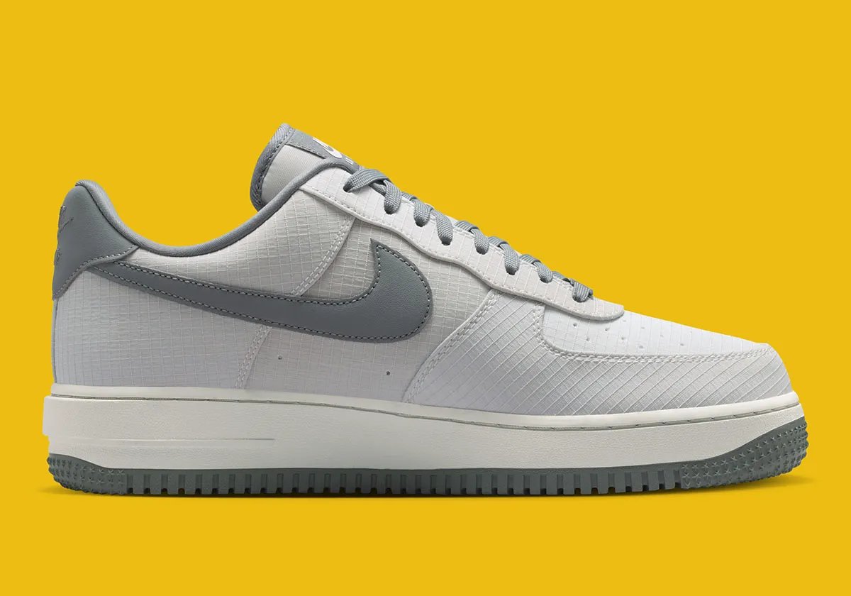 Nike Air Force 1 featuring Vibram outsole technology in neutral colorway, detail shot showing grip-focused rubber sole pattern - detail view 2