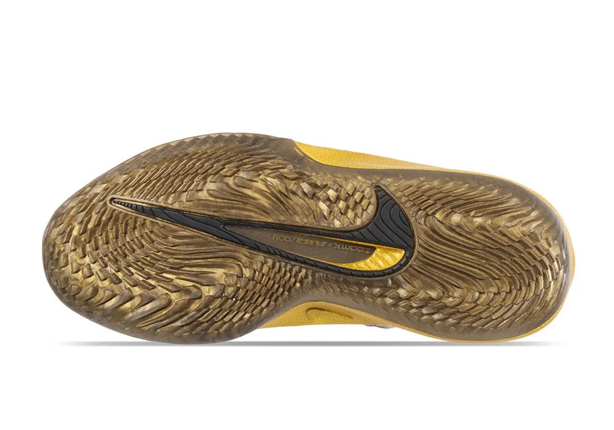 Nike GT Cut 4 in Jordan Poole's gold colorway with black trim and bronze translucent outsole - detail view 4