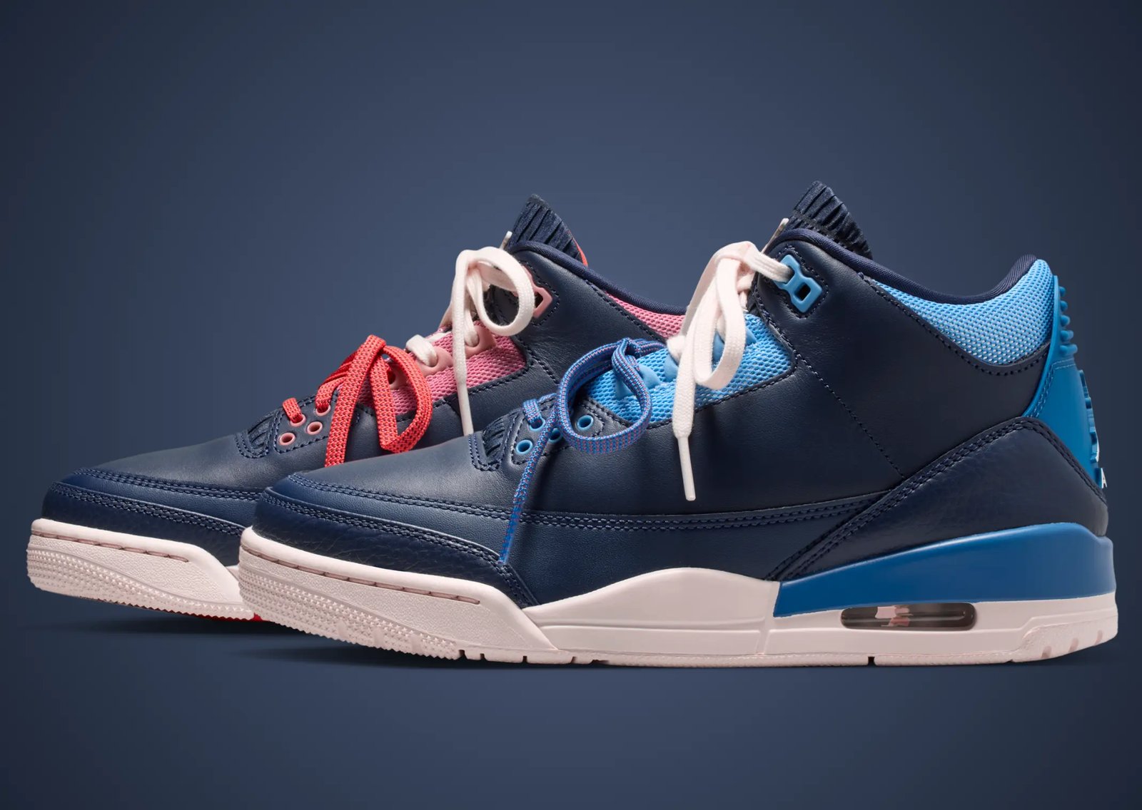 Air Jordan 3 Sports Renaissance featuring navy blue upper with mismatched red and blue asymmetrical accents, nylon mesh detailing, and scrunched tongue design - detail view 3