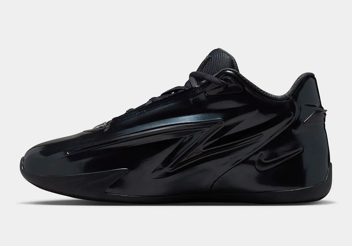 Nike KD 19 Candy in jet black with Stadium Green insole branding, side profile view - detail view 1