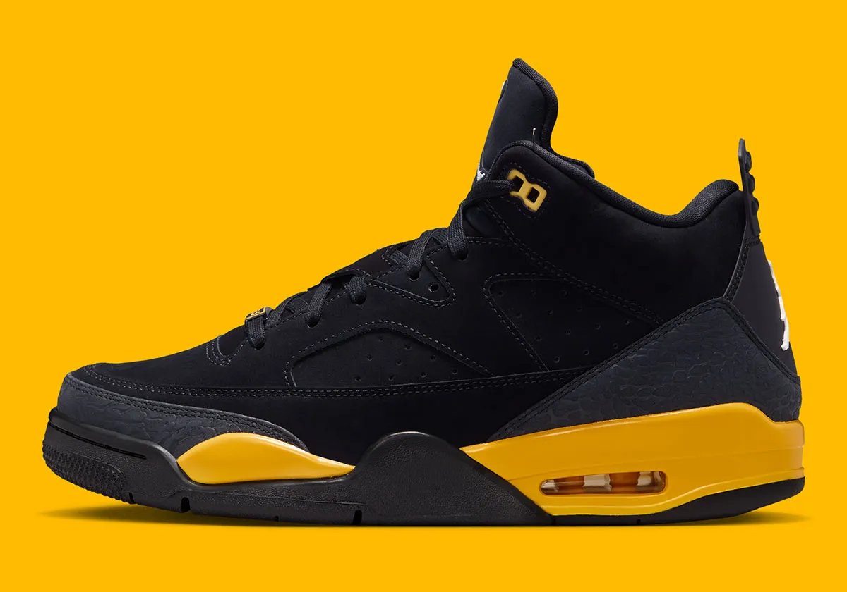 Jordan Son of Mars Low in Thunder colorway featuring black upper with Dark Smoke Grey elephant print and Tour Yellow sole accents - detail view 1