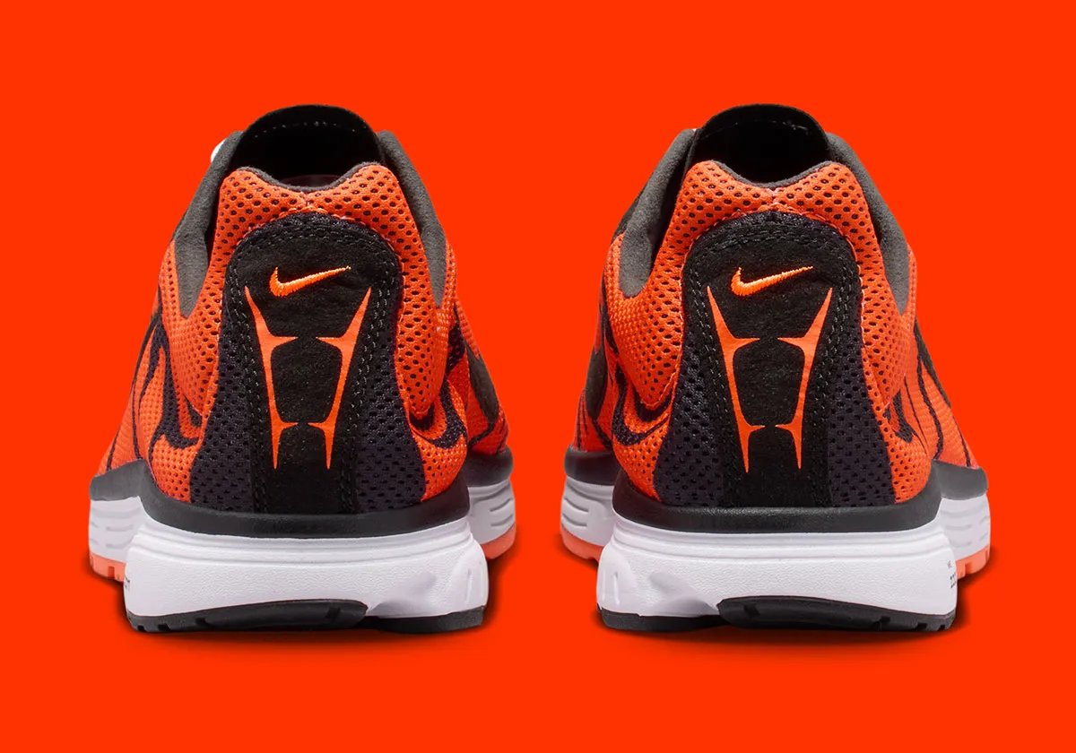 Nike Zoom Streak 3 in Safety Orange colorway with black stripes and white accents on laces and sole - detail view 4