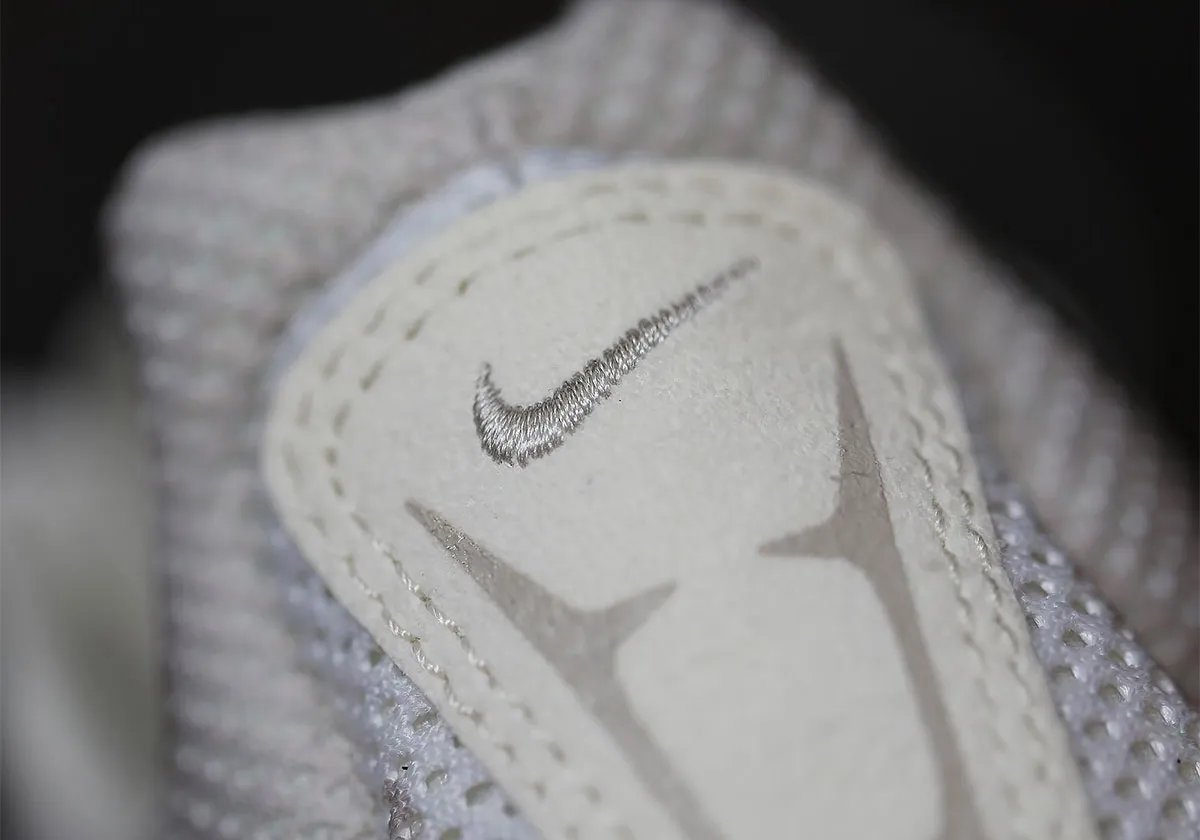 Nike Zoom Streak 3 in Cream II/Sail colorway, showing the flush upper construction and neutral palette of the 2009 performance runner returning as a lifestyle model - detail view 3