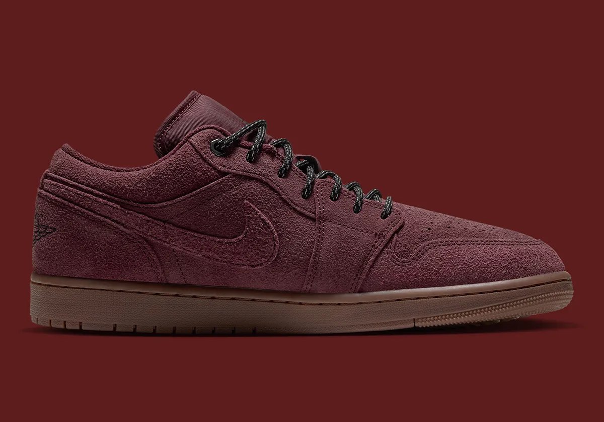 Nike Air Jordan 1 Low 'Dark Team Red' featuring shaggy suede, two-tone boot laces, and gum rubber sole in autumn colorway - detail view 2