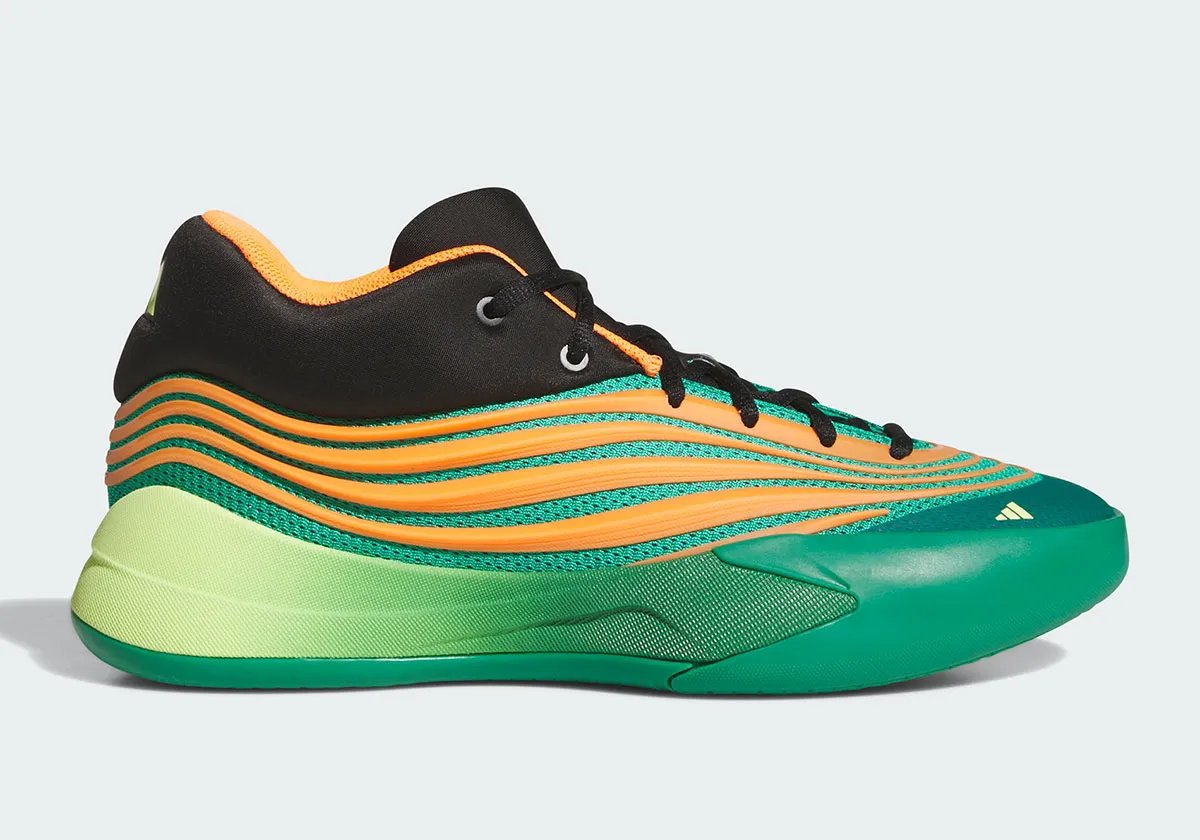 adidas Dame X "Meet the Moment" in black synthetic with orange trim and viridescent gradient sole, worn by Damian Lillard - detail view 1