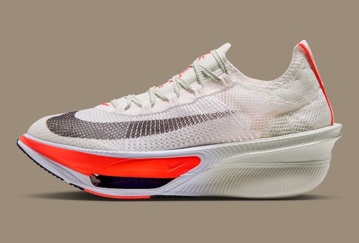 Nike AlphaFly 4 in Sea Glass and Laser Crimson with ZoomX cushioning visible in midsole, official product imagery - detail view 3