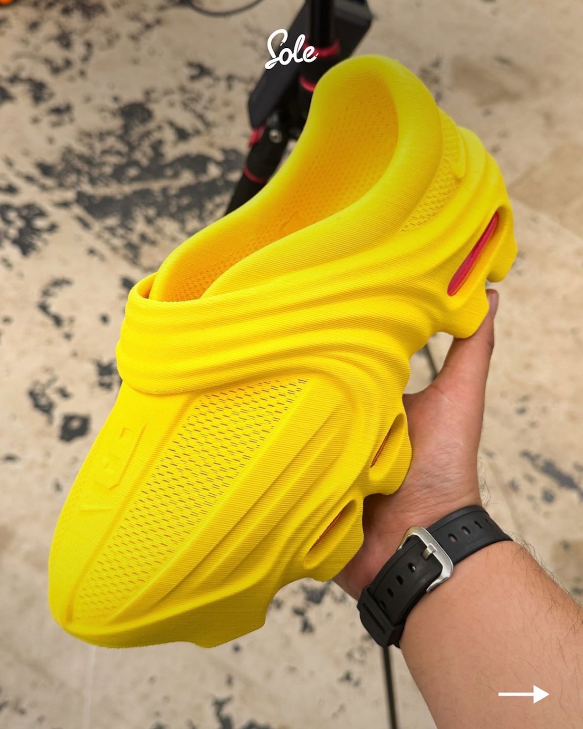 Tasnim Chowdhury's 3D-printed Nike Air Works sneaker featuring curved midsole sections and exposed Air cushioning units, side profile view. - detail view 3