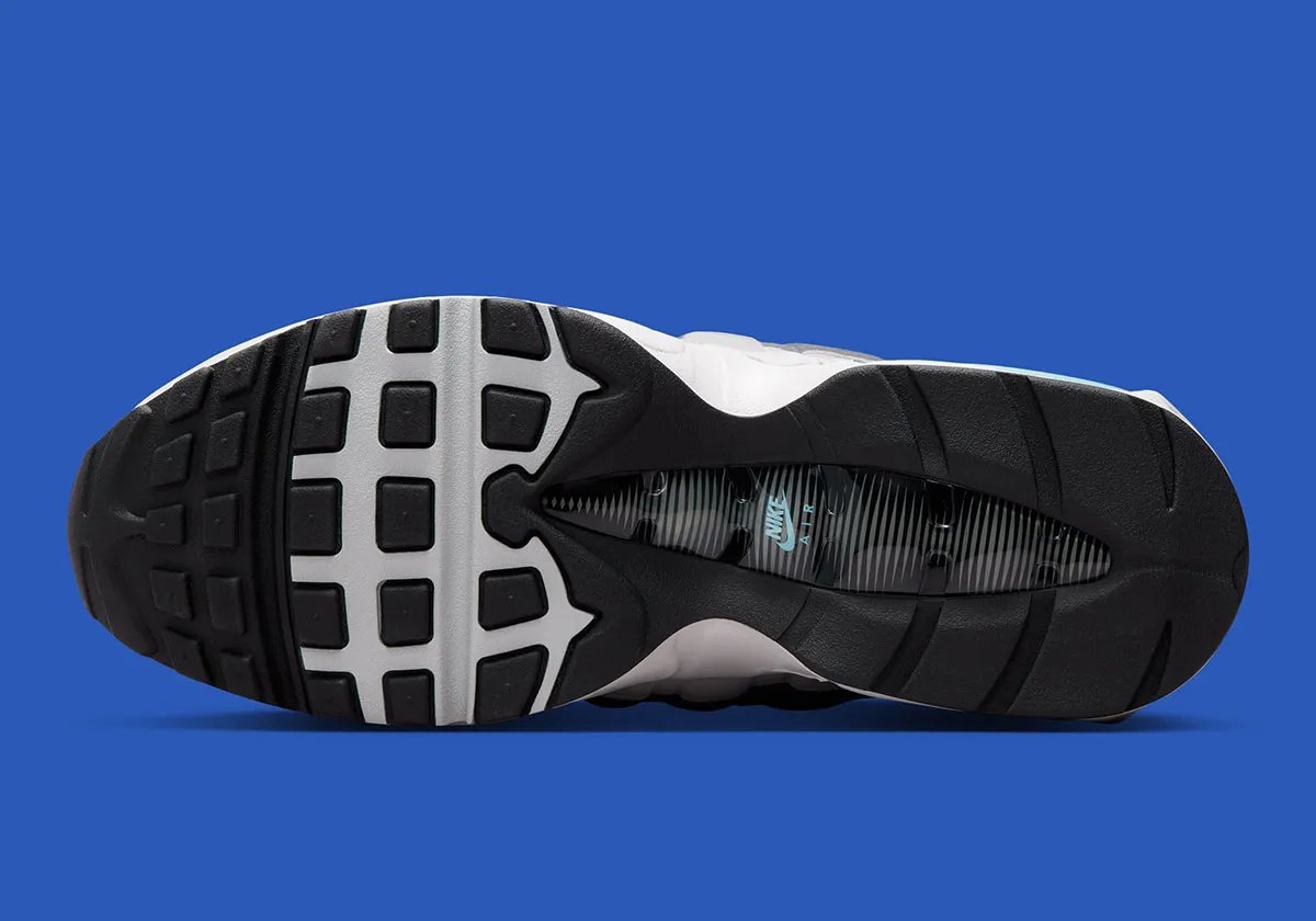 Nike Air Max 95 in Black with grey suede panels and Football Blue Swoosh, showing patent leather side paneling detail - detail view 2