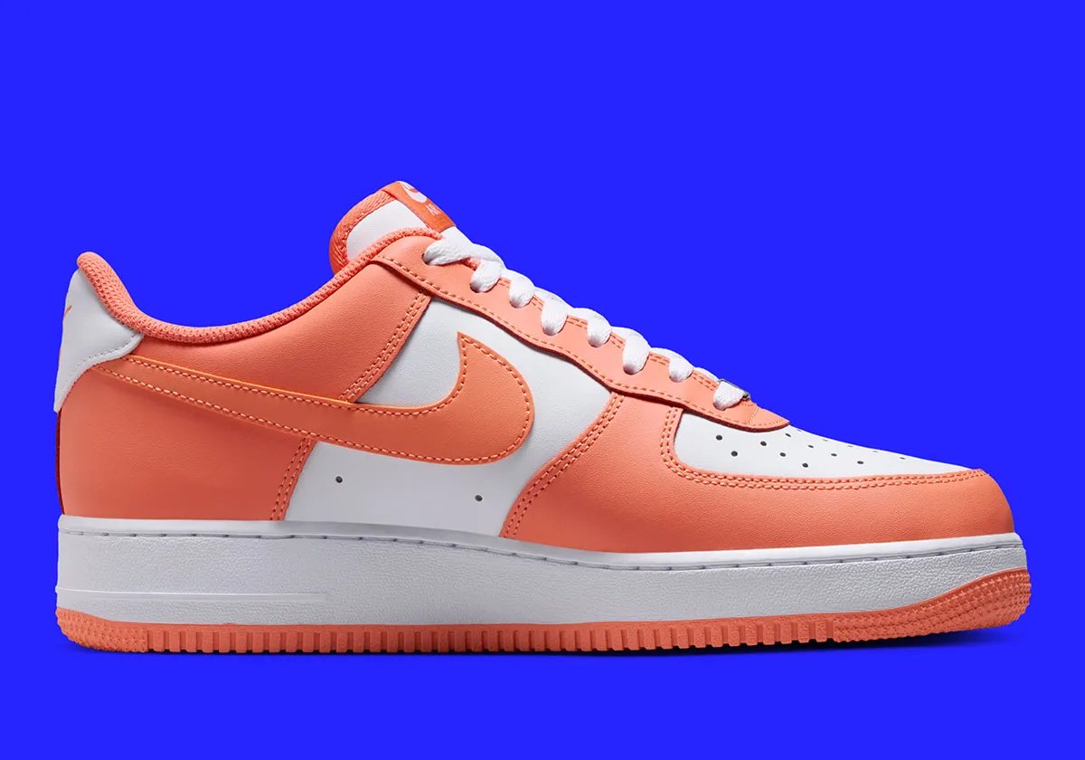 Nike Air Force 1 Low in Orange Frost colorway showing full lateral and medial views - detail view 2
