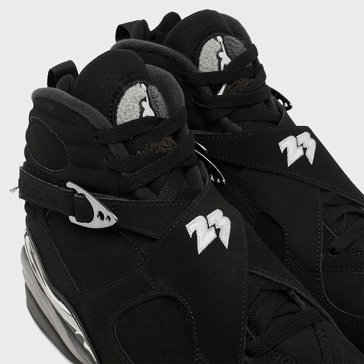 Air Jordan 8 Black Chrome featuring black upper with chrome accents and white/grey/black mudguard detailing - detail view 4
