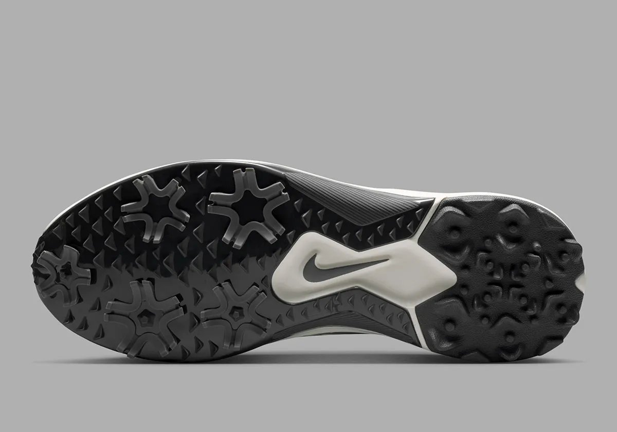 Nike Pegasus 1 Golf in black colorway, showing lateral support plates and hybrid traction system - detail view 2