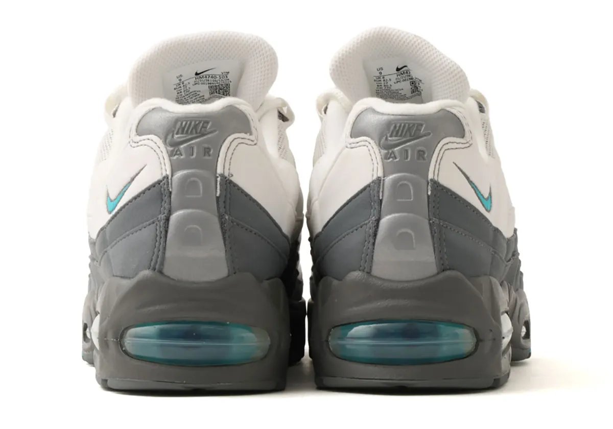 Nike Air Max 95 in Dark Smoke Grey and Summit White with Dusty Cactus teal accents on Swoosh and Air units - detail view 1