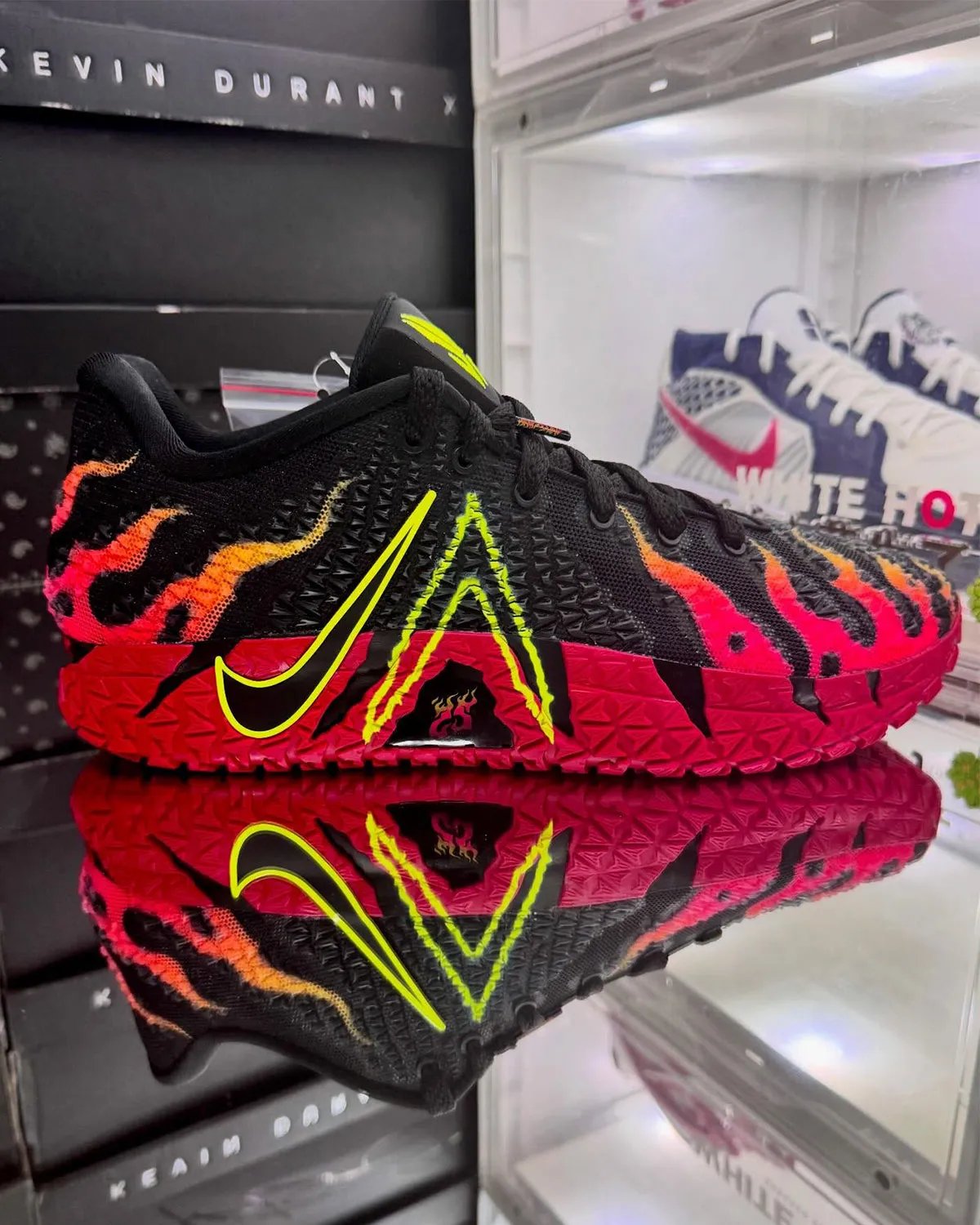 Nike Ja 3 WNBA player exclusive in bold colorway, side profile view showing extended collar and geometric sole structure - detail view 2