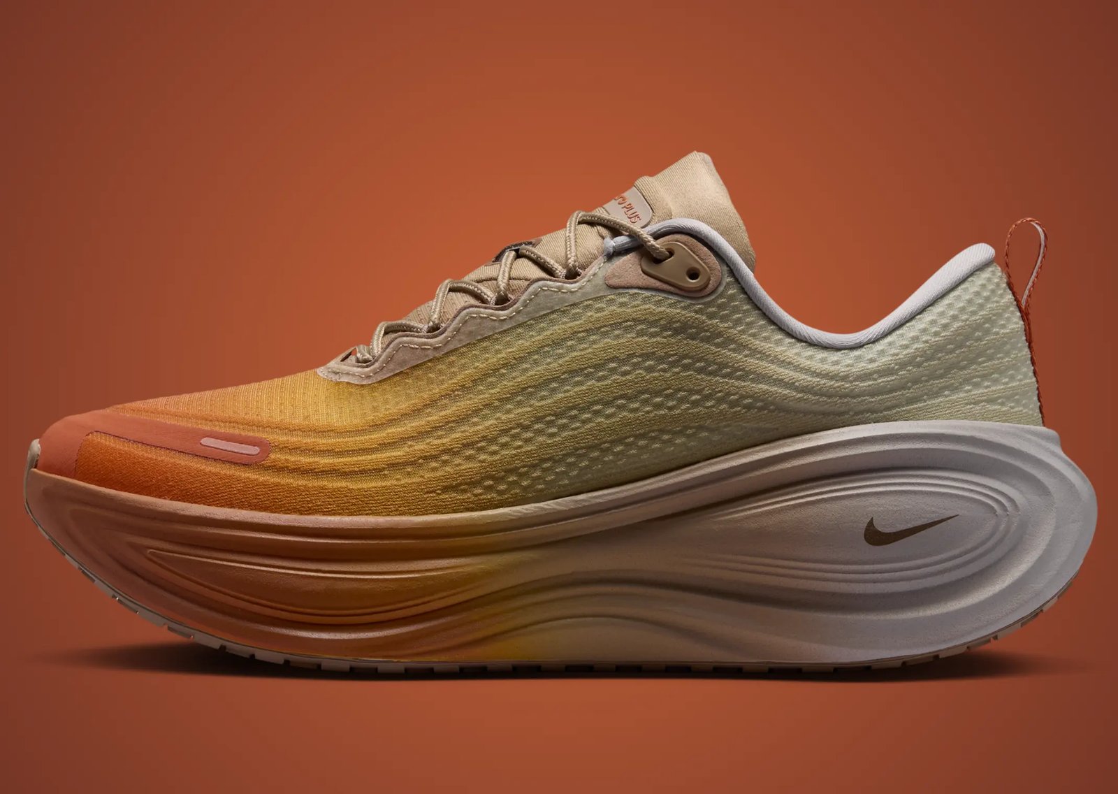 Nike Vomero Plus Cheat Day showing orange-to-grey gradient with Cheeto-inspired insole graphics - detail view 3