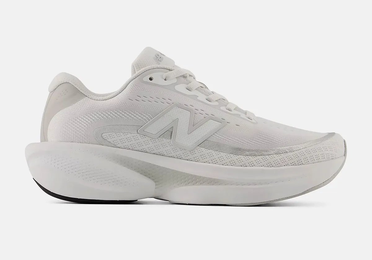 New Balance Ellipse running shoe in neutral colorway, showing mesh upper and foam cushioning profile - detail view 5