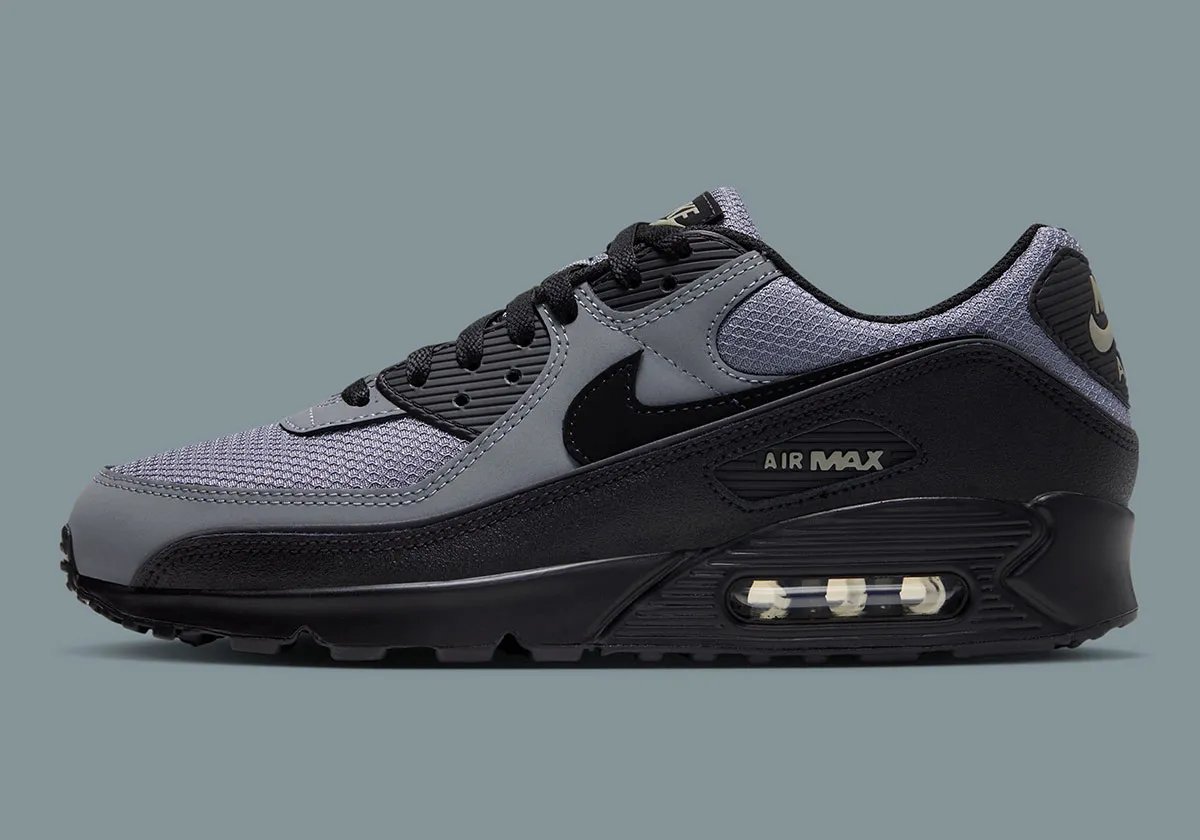 Nike Air Max 90 Cool Grey showing monochromatic greyscale leather and mesh construction with Light Army accents - detail view 1