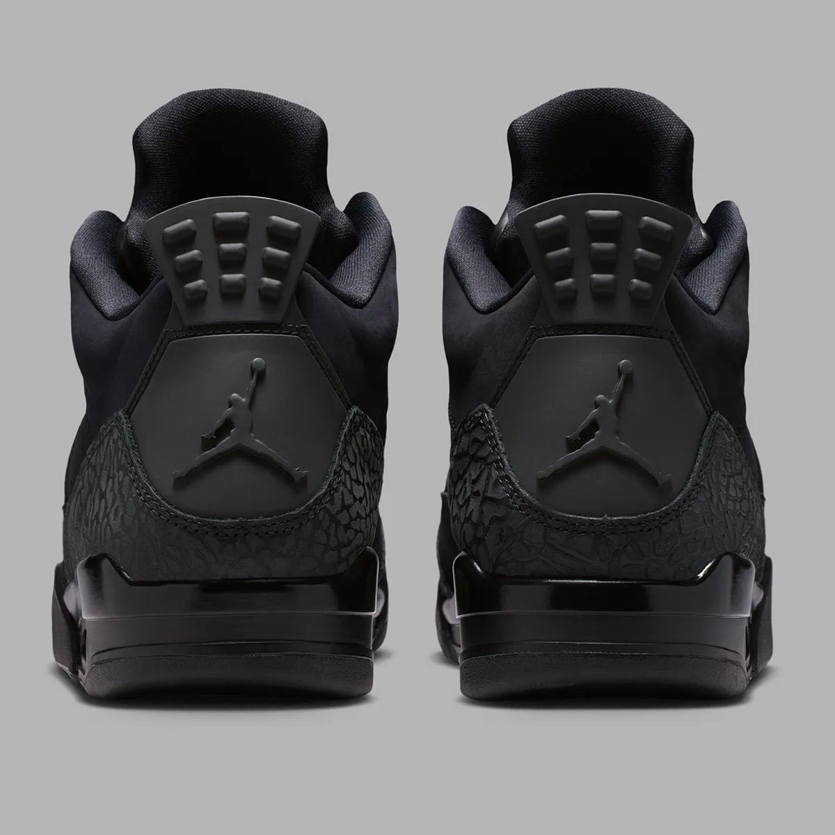 Jordan Son Of Mars Low in Black Cat colorway, full monochromatic black upper with visible Air unit and hybrid design elements from Air Jordan 3-6 - detail view 4