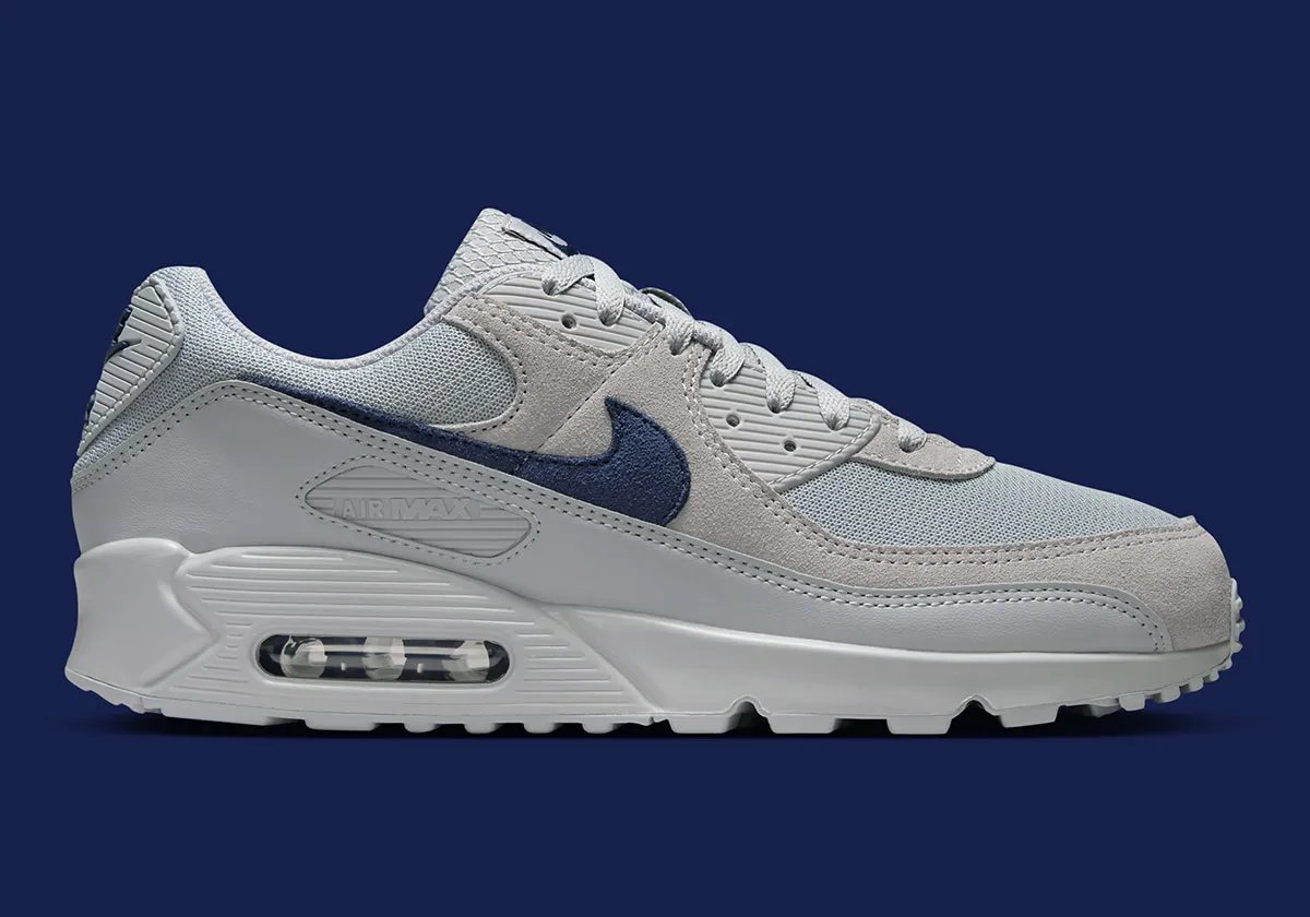 Nike Air Max 90 in team-aligned colorway styled for stadium wear - detail view 2