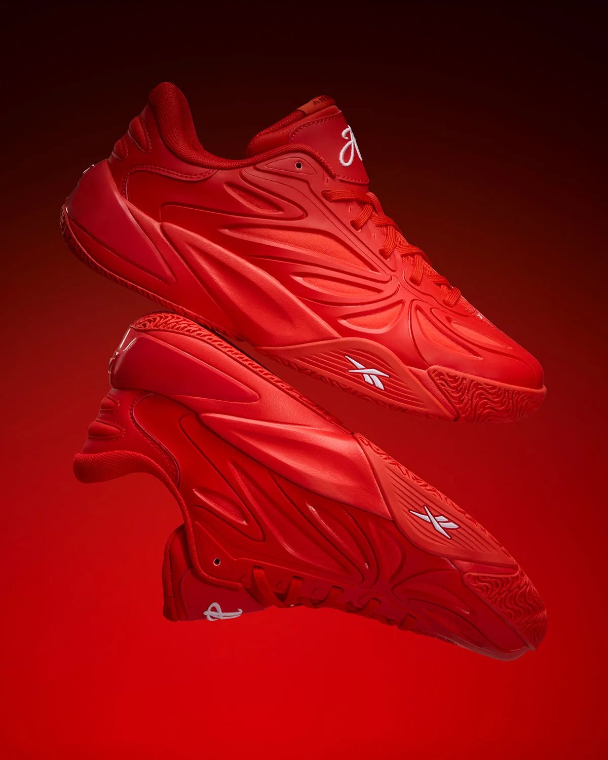 Reebok Angel Reese 1 in Atlanta Dream red with white branding, lateral view - detail view 2